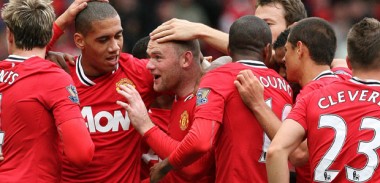 Manchester United players celebrate together