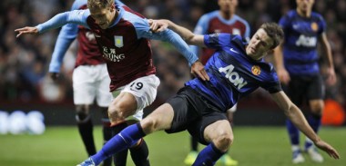 Michael Carrick in action for Manchester United v Aston Villa