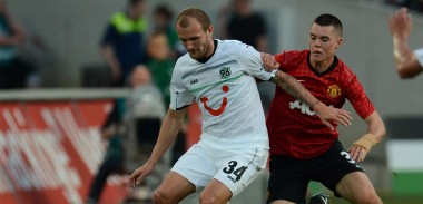 Michael Keane in action against Hannover 96